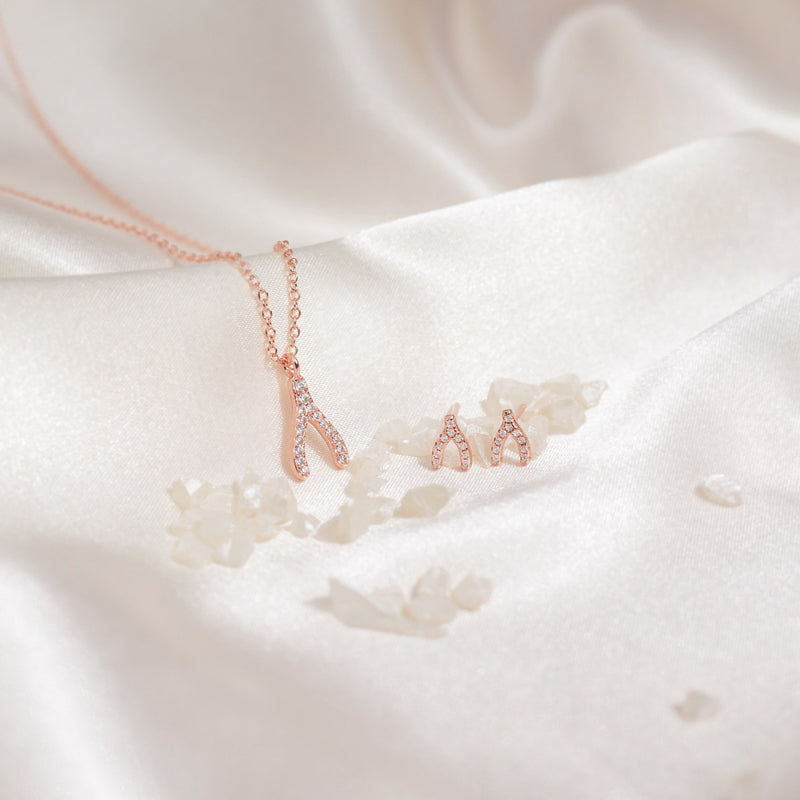 Theia Wishbone Studs.